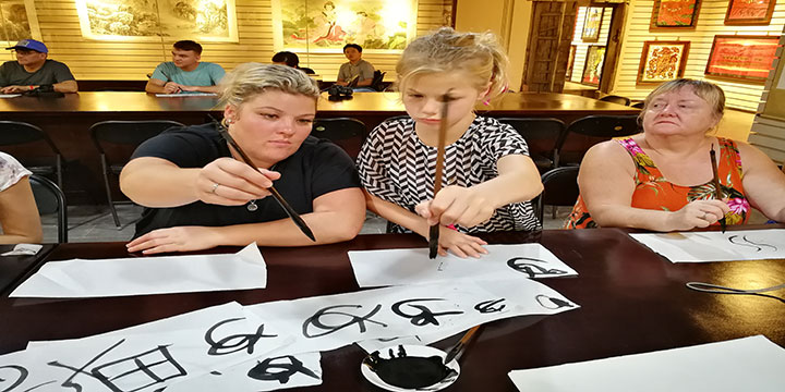 Child practicing Chinese calligraphy in Xi’an Child practicing Chinese calligraphy in Xi’an