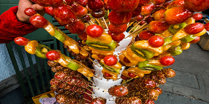 Sugar-coated fruit sold as a street snack in China Sugar-coated fruit sold as a street snack in China