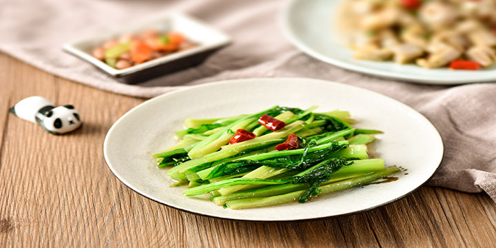 Seasonal Chinese greens stir-fried with garlic Seasonal Chinese greens stir-fried with garlic