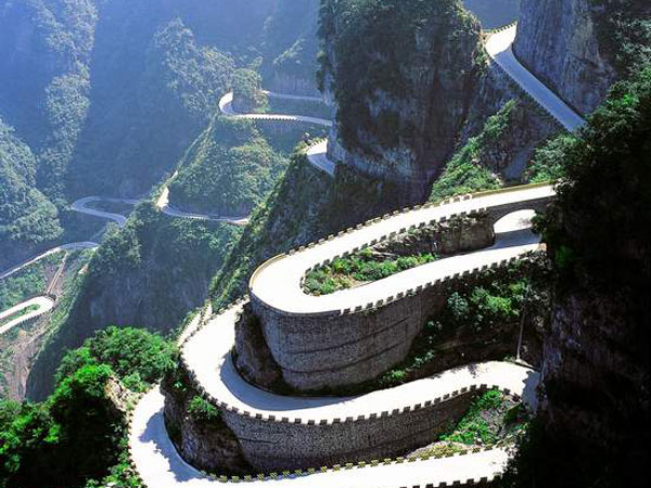 Tianmen Mountain road winding through forested slopes