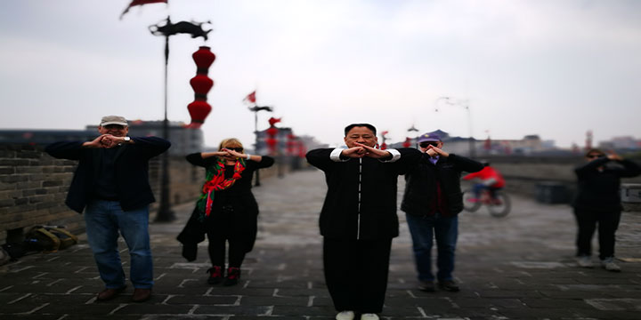 A morning tai chi session on Xi’an City Wall A morning tai chi session on Xi’an City Wall