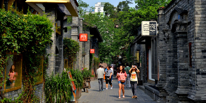 Visitors walking through Kuan Zhai Alley in Chengdu Visitors walking through Kuan Zhai Alley in Chengdu