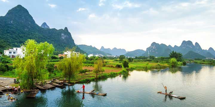 Bamboo-style passenger rafts on the Yulong River near Yangshuo Bamboo-style passenger rafts on the Yulong River near Yangshuo