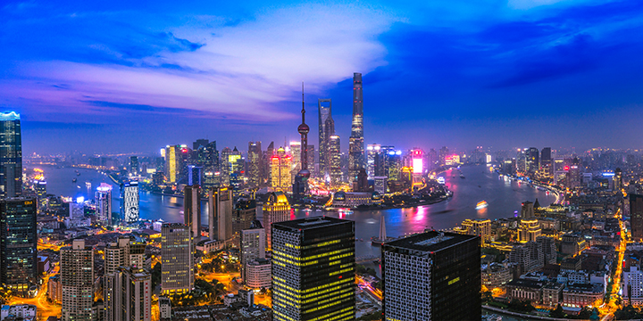 The Bund and Pudong skyline illuminated at night in Shanghai The Bund and Pudong skyline illuminated at night in Shanghai