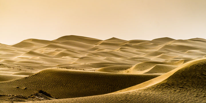 Layered sand dunes across the Taklamakan Desert Layered sand dunes across the Taklamakan Desert