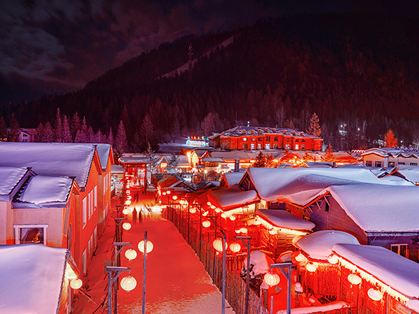 China Snow Town illuminated during the late-winter season
