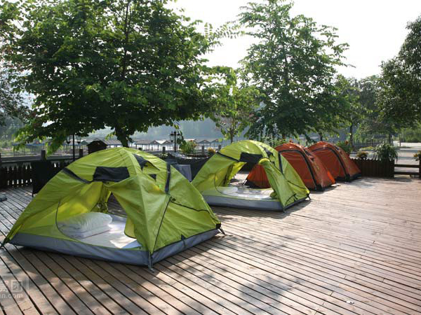Tents at a managed Yangshuo campsite illustrating outdoor activity planning Tents at a managed Yangshuo campsite illustrating outdoor activity planning