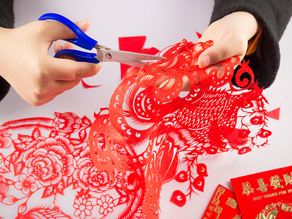 Artist-made Chinese paper-cut showing fine hand-cut details