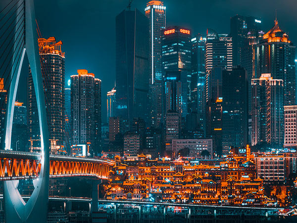 Hongya Cave and the illuminated riverfront in Chongqing