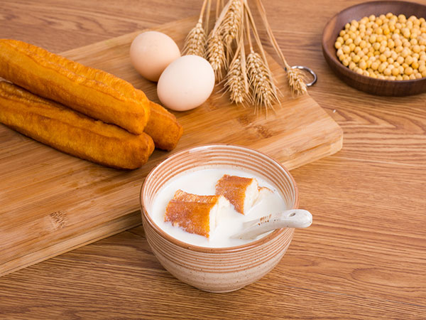 Fresh youtiao served with soy milk for breakfast