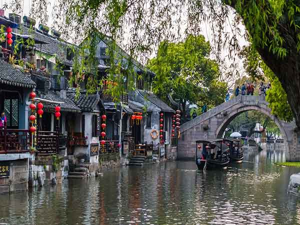 Suzhou canal and stone bridge illustrating the water-town context Suzhou canal and stone bridge illustrating the water-town context