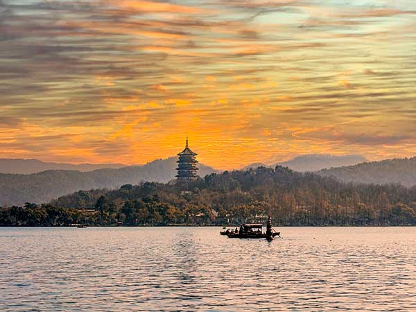 Leifeng Pagoda and West Lake at sunset in Hangzhou