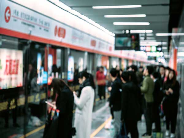 Passengers waiting on a metro platform in a Chinese city Passengers waiting on a metro platform in a Chinese city