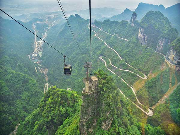 Cable cars above sandstone peaks in Zhangjiajie National Forest Park