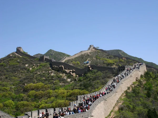 Restored Badaling Great Wall across the mountain valley in spring