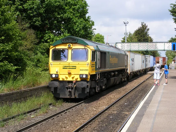 Container freight train approaching a European port terminal Container freight train approaching a European port terminal