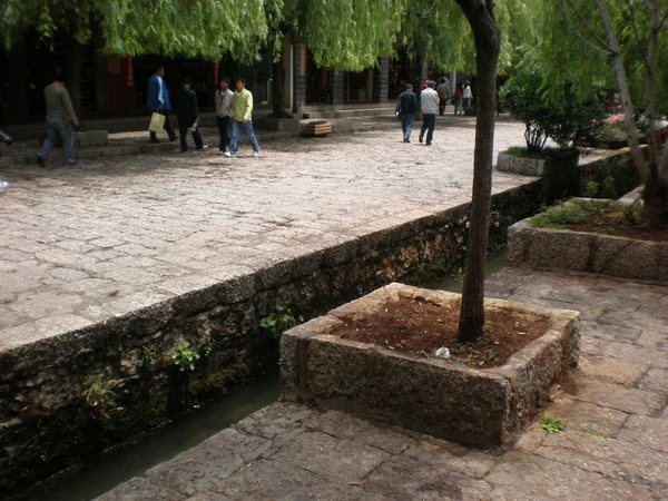 Waterways and tiled houses in the UNESCO-listed Old Town of Lijiang Waterways and tiled houses in the UNESCO-listed Old Town of Lijiang