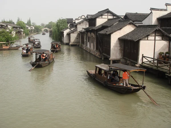 Canal, stone bridge and waterside houses in Wuzhen Water Town, Zhejiang Canal, stone bridge and waterside houses in Wuzhen Water Town, Zhejiang
