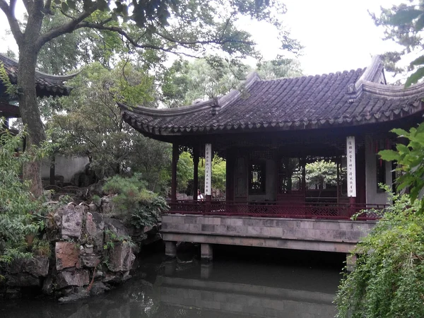 Pavilion, rocks and water in a classical Suzhou garden