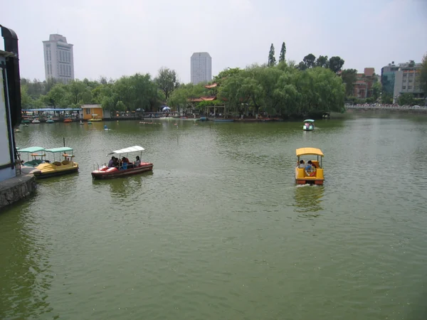 Pleasure boats on Green Lake in Kunming, capital of Yunnan Province