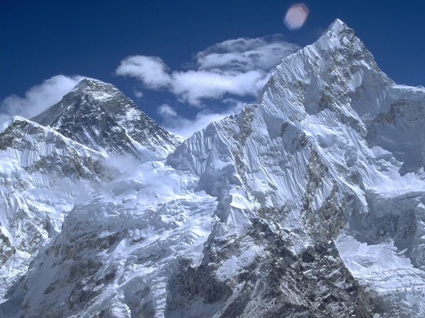 Real banner cloud streaming from the summit of Mount Everest Real banner cloud streaming from the summit of Mount Everest