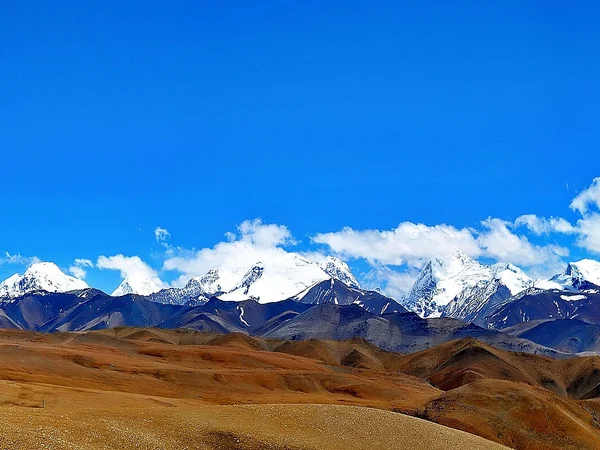 Real north-side panorama near Everest beneath high Himalayan clouds Real north-side panorama near Everest beneath high Himalayan clouds