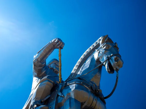 Modern equestrian statue of Genghis Khan beneath an open sky Modern equestrian statue of Genghis Khan beneath an open sky