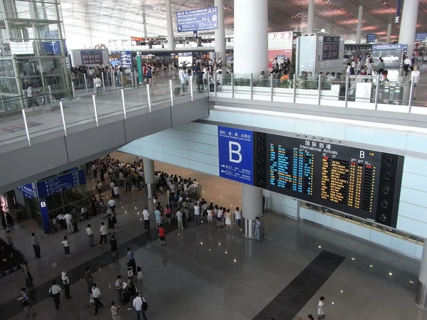 Passenger concourse inside Terminal 3 at Beijing Capital International Airport Passenger concourse inside Terminal 3 at Beijing Capital International Airport