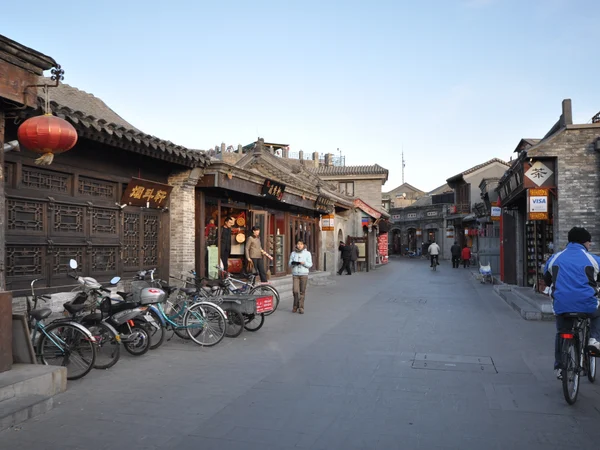 Residential lane and courtyard entrances in a Beijing hutong Residential lane and courtyard entrances in a Beijing hutong