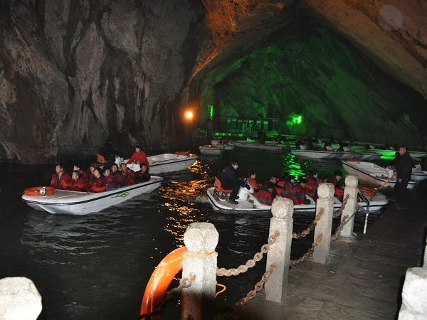 Illuminated underground river inside Benxi Water Cave in Liaoning