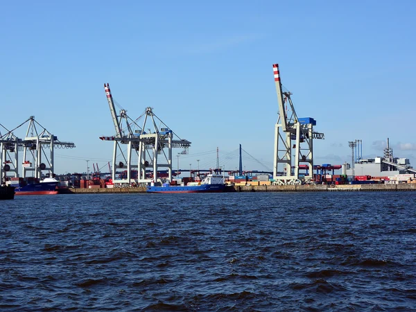 Container terminal illustrating modern maritime trade infrastructure Container terminal illustrating modern maritime trade infrastructure