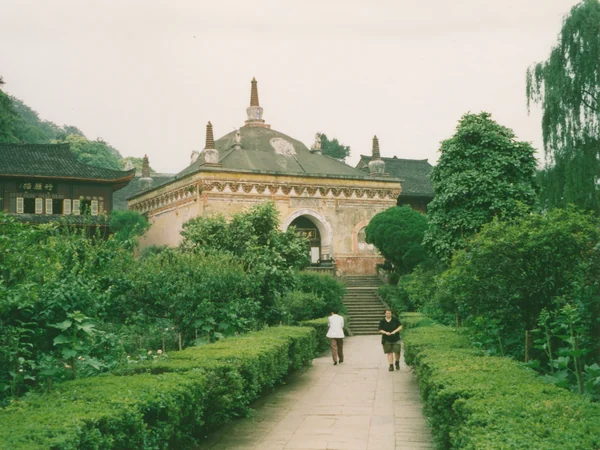 A Buddhist temple among the forested slopes of Mount Emei A Buddhist temple among the forested slopes of Mount Emei