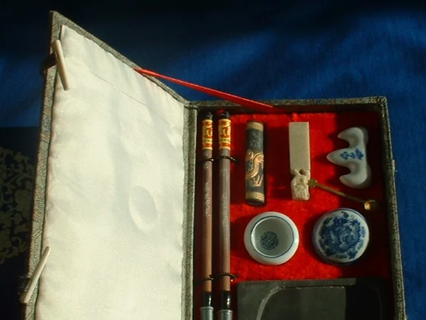 Brush, ink stick, paper and inkstone used for Chinese calligraphy