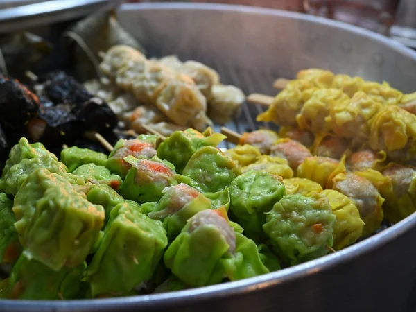 Assorted steamed dim sum prepared for restaurant service Assorted steamed dim sum prepared for restaurant service