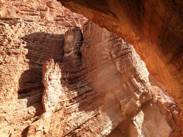 Narrow red sandstone walls inside Kuqa Grand Canyon in Xinjiang