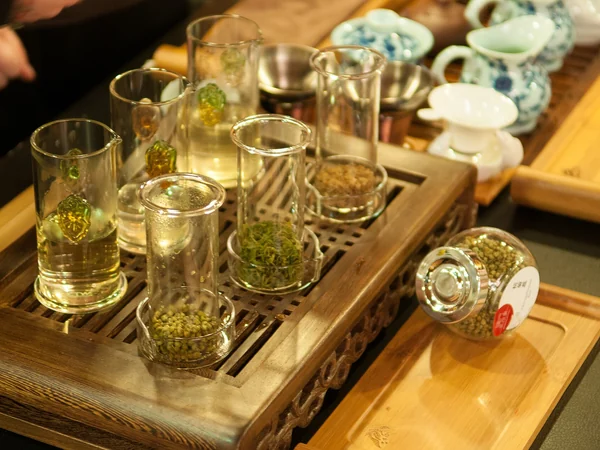 Quiet Chinese tea setting with simple vessels and natural light
