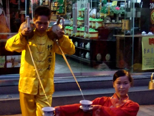 Long-spout kettle demonstration in a traditional Chengdu teahouse