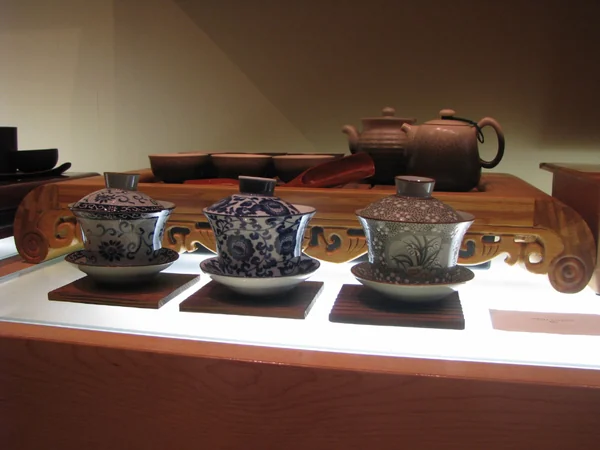 Gaiwan and practical tools arranged on a Chinese tea tray