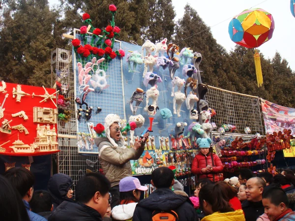 A folk toy stall at a public temple fair in China