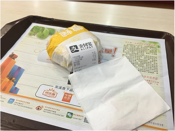 An Alipay QR payment sign displayed at a Chinese shop An Alipay QR payment sign displayed at a Chinese shop