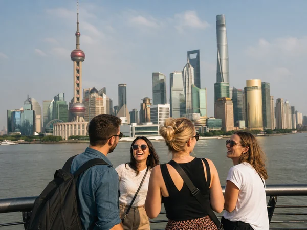 International travelers sightseeing at the Shanghai Bund
