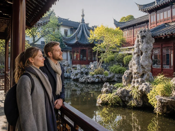 European travelers exploring Yu Garden in Shanghai