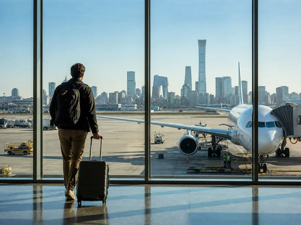 Traveler arriving in Beijing for a journey from the United States
