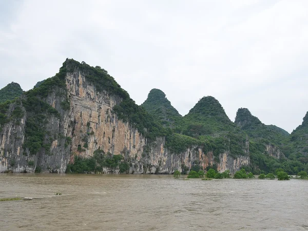 Karst peaks beside the Li River illustrating the geography of China