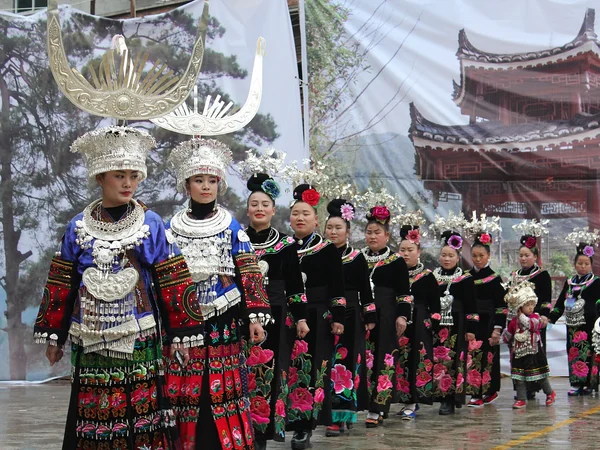 Miao women at a village festival representing the ethnic cultures of China