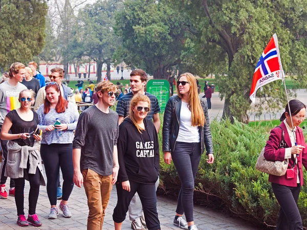 A tour group being led through the Temple of Heaven in Beijing
