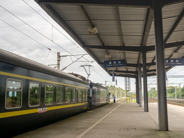 Passenger train at Tongnan Railway Station in China