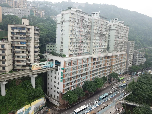 Chongqing Rail Transit Line 2 passing through the building at Liziba Station Chongqing Rail Transit Line 2 passing through the building at Liziba Station