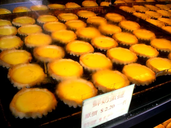 Fresh egg tarts displayed at a Hong Kong bakery Fresh egg tarts displayed at a Hong Kong bakery