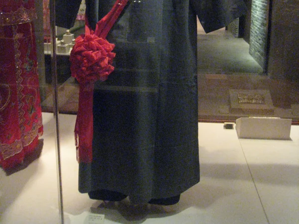 A long Chinese male wedding robe displayed in a Hong Kong museum A long Chinese male wedding robe displayed in a Hong Kong museum